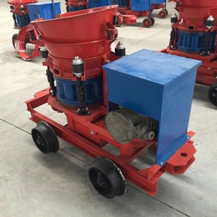 How high can the dry shotcrete machine spray?